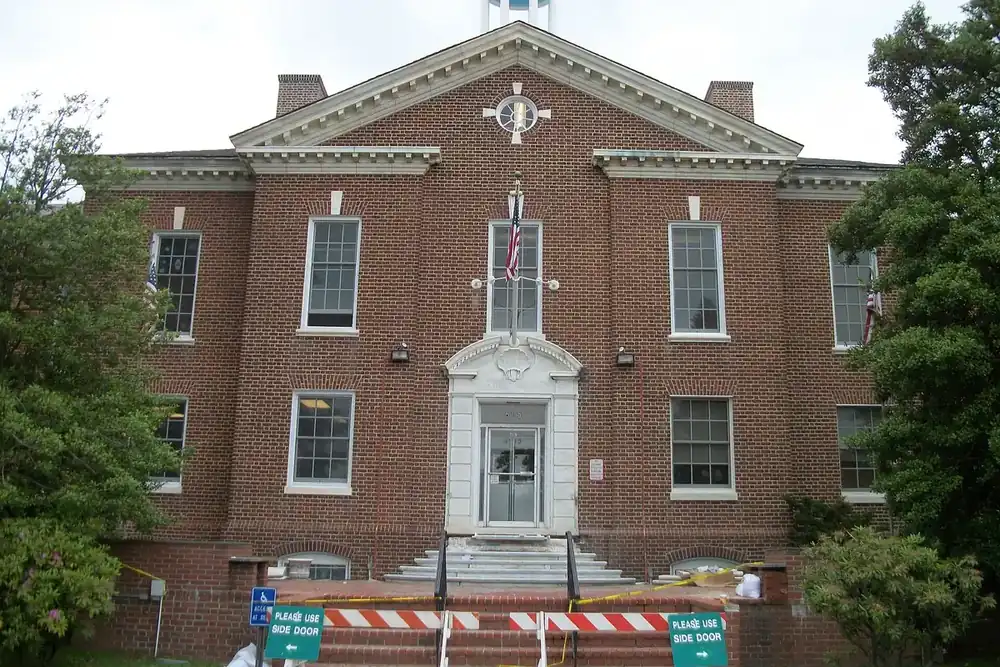 Islip Town Hall, a red brick building with a white cupola in Islip, New York